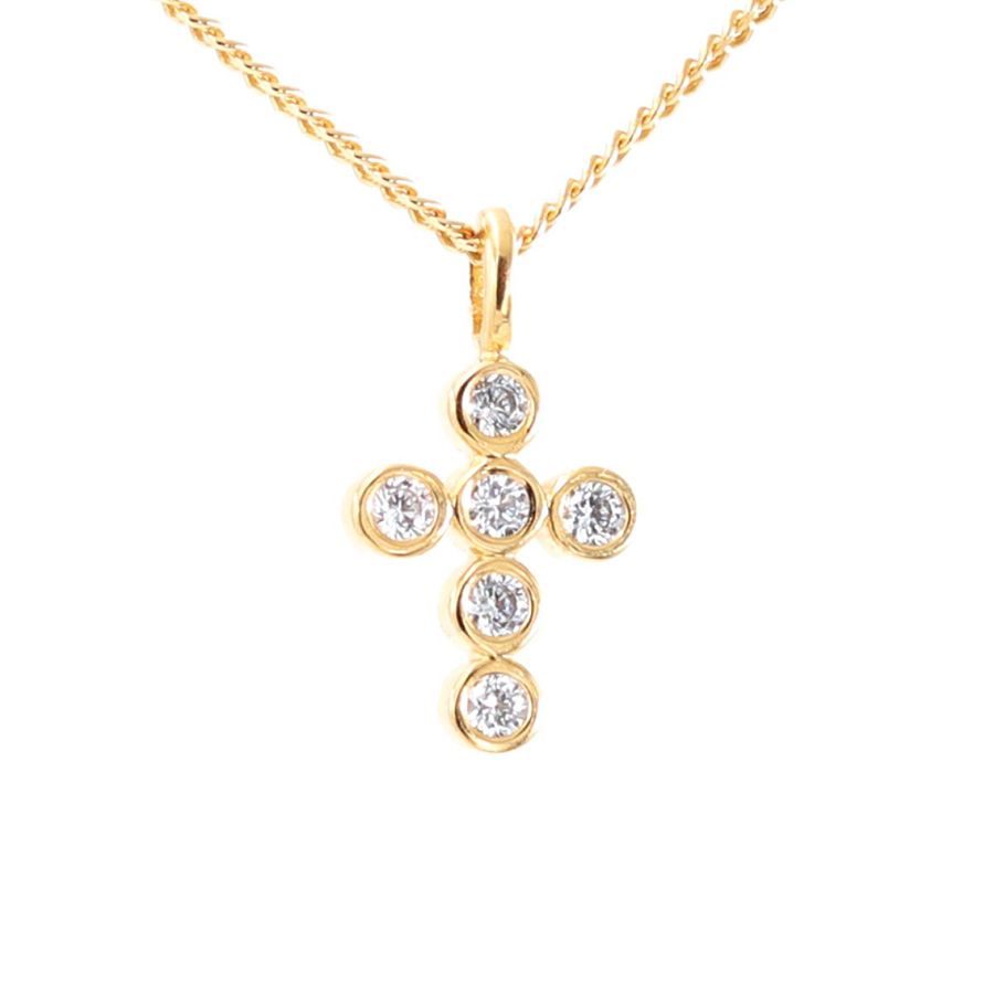 Schmuckanhänger in Form eines Kreuzes mit Diamanten besetzt