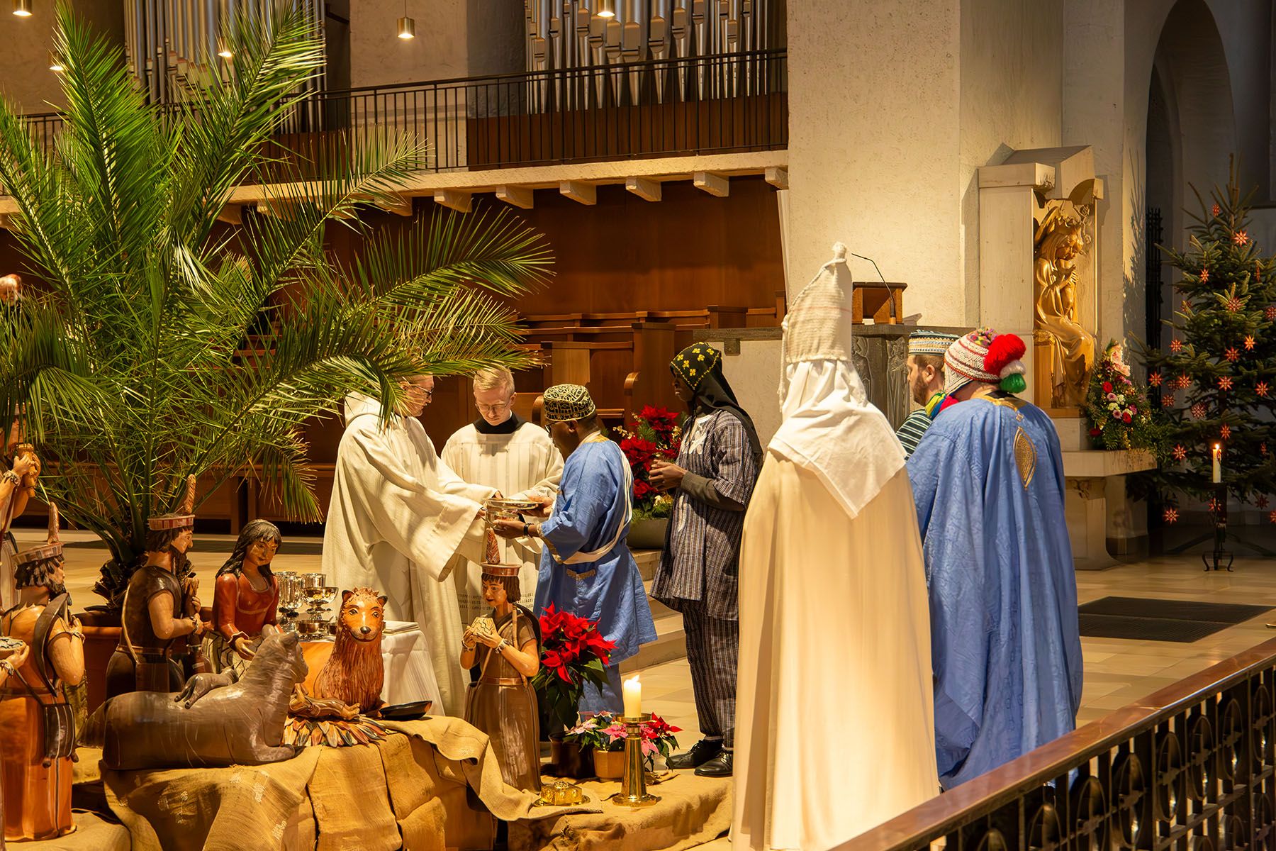 Übergabe von Brot und Wein an der Krippe